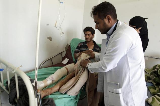 A Yemeni man receives treatment at a hospital in the capital Sanaa on April 21, a day after he was wounded in a Saudi-led airstrike