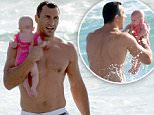 ***NO WEB USAGE BEFORE 9PM PST, TUESDAY APRIL 21, 2015.***\nEXCLUSIVE TO INF.\nApril 20 2015: Hayden Panettiere's fianc&Egrave; and World Heavyweight Champion Wladimir Klitschko plays in the surf with his baby daughter Kaya in Miami Beach, FL.\nMandatory Credit: INFphoto.com Ref: infusmi-13