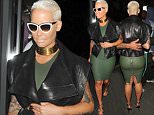 Picture Shows: Amber Rose  April 22, 2015
 
 Amber Rose spotted as she exits the W Hotel in London, England. Amber looked great in a tight green dress and sleeveless leather jacket.
 
 Non Exclusive
 WORLDWIDE RIGHTS
 
 Pictures by : FameFlynet UK &copy; 2015
 Tel : +44 (0)20 3551 5049
 Email : info@fameflynet.uk.com